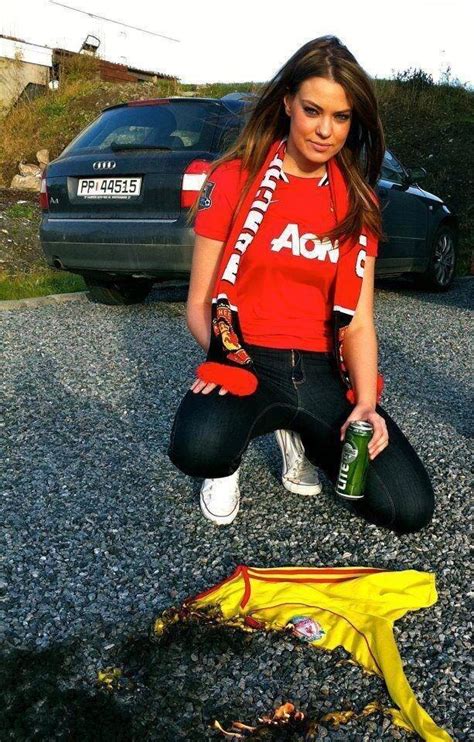 Photo Female Manchester United Fan Burns Liverpool Shirt In Driveway