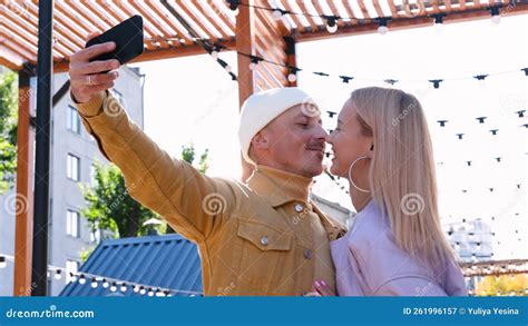 A Couple In Love A Guy And A Girl Take A Selfie Together In Sunny