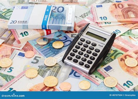 calculator  euro notes  coins stock photo image  finance loan