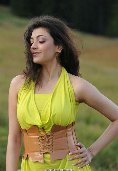 Kajal Agarwal Hot In Mini Yellow Skirt Stills Hot Wallpapers Photos