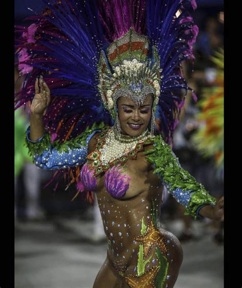 A Reveller Dances Along At The Rio Carnival Rio Carnival
