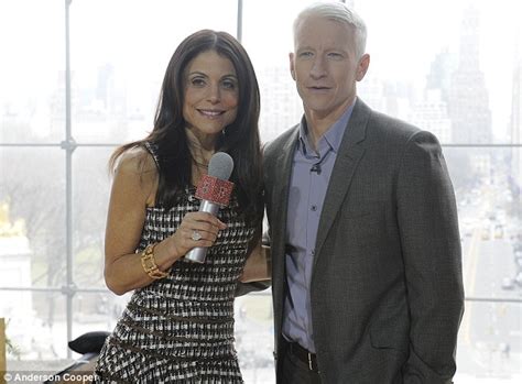 bethenny frankel flashes her underwear while challenging anderson cooper to a push up contest