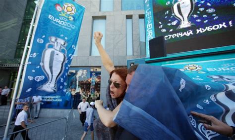 Topless Activists Grab European Championship Trophy During