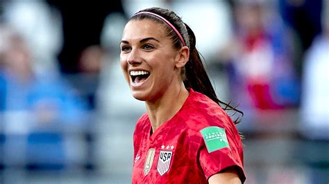 alex morgan wears  pink headband   soccer match allure