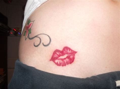 i want lips tattooed for some reason like behind my ear or something