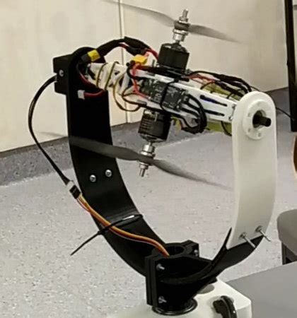 prototype   proposed rotor  gimbal mechanism  consists   scientific