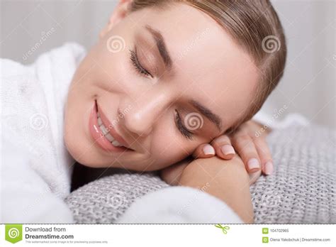 Pretty Girl Lying On Massage Table At Wellness Center Stock Image