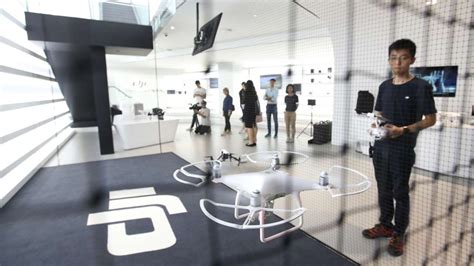 drone maker djis  hong kong store offers customers  chance  fly  buying south