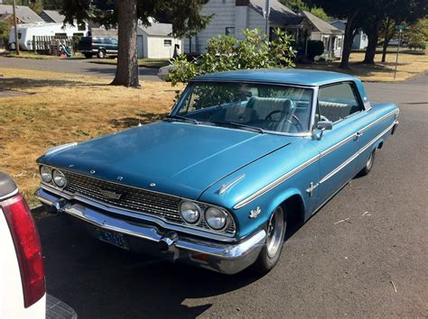 parked cars  ford galaxie xl