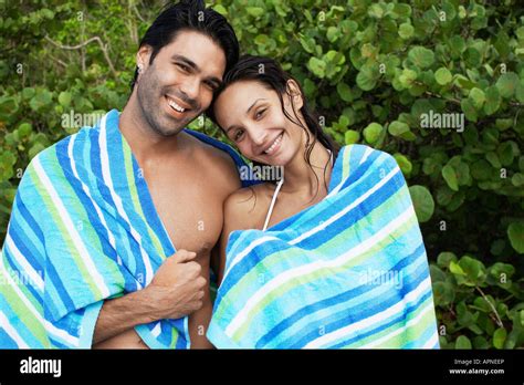 young couple wrapped  towel portrait stock photo alamy