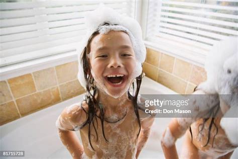 girl foamy bath photos and premium high res pictures getty images