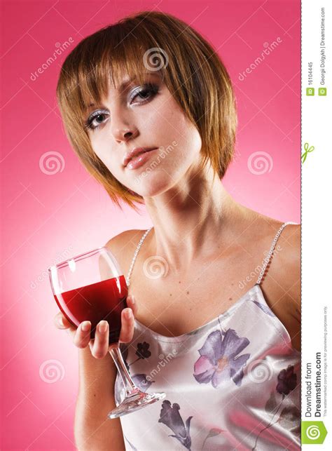 beautiful woman with a glass of wine royalty free stock