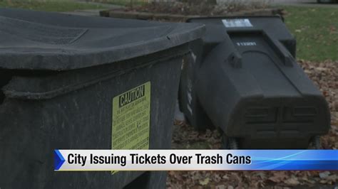 city of detroit issuing tickets over trash cans