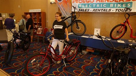 woman  standing    bike   store   bicycles  display