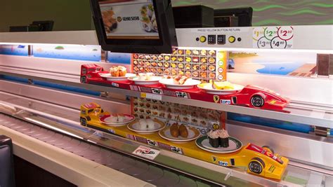 genki sushi brings high speed rail   waikele center restaurant pacific business news