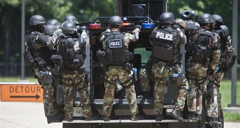 member swat team raids home  man  registered gun   grid news