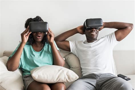 Premium Photo Black Couple Experiencing Virtual Reality With Vr Headset