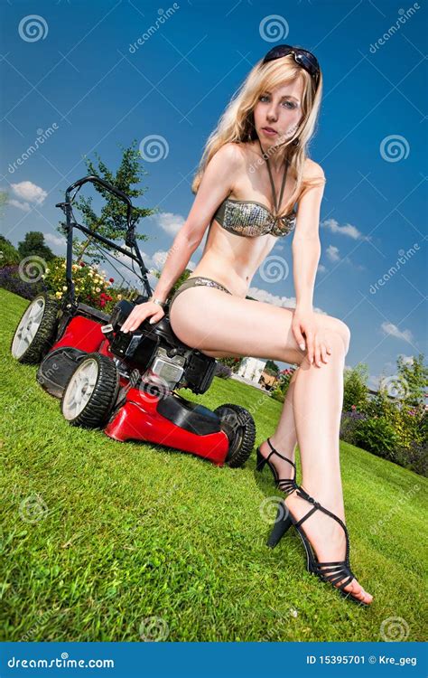 Sexy Mowing Sexy Woman Sitting A Lawn Mower On White Background Stock