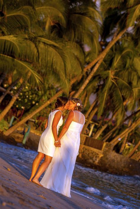 lesbian wedding kisses on the beach in maui lipstick