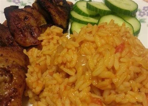 Nigerian Jollof Rice And Chicken And Plantain Chicken And Jollof Rice