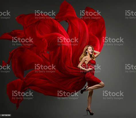 Fashion Model Red Dress Woman Dancing Flying Fabric Waving Cloth Stock
