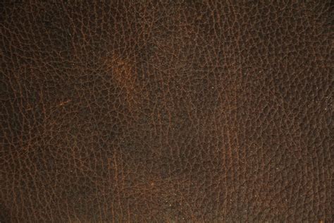 dark leather texture brown clouded hand  genuine stock photo