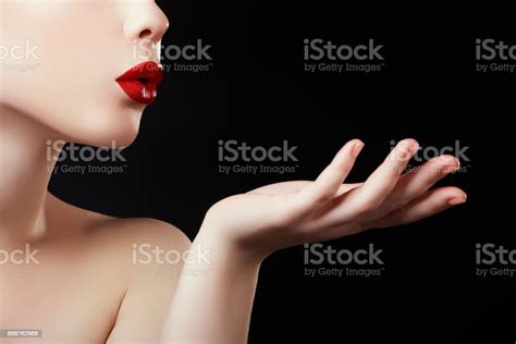 Beautiful Young Woman Blowing A Kiss From Her Hand Model With Perfect