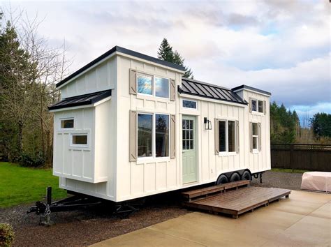 photo      tiny trailer home boasts soothing beach vibes dwell