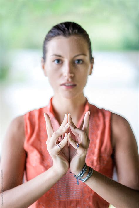 Woman Doing Yoga Mudra By Stocksy Contributor Alexander Grabchilev