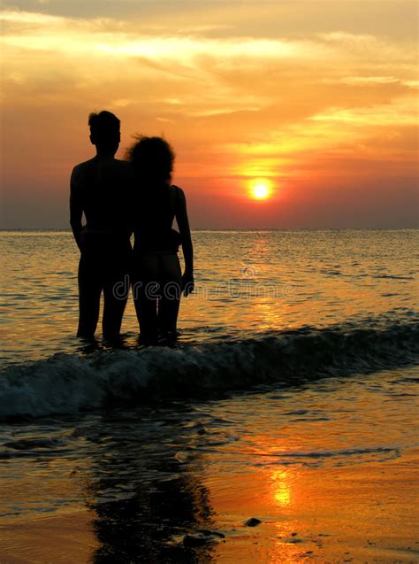 Couple On Beach Sunrise Stock Image Image Of Golden