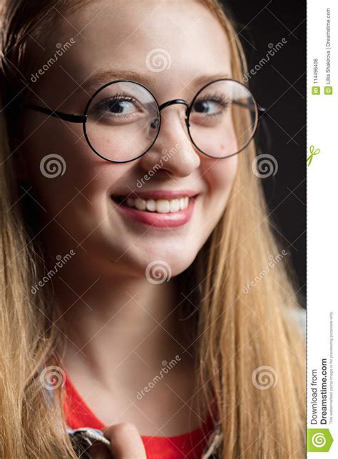 Close Up Shot Of Young Woman In Glasses On A Black Background The Girl