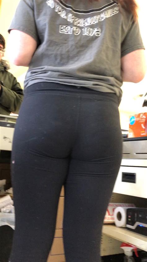 teen at her cash register up close spandex leggings and yoga pants