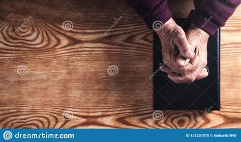 Hands Of Elderly Woman Praying Religion Concept Stock