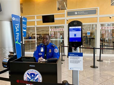 tsa travelers  wear face masks  waiting    security screening  points guy