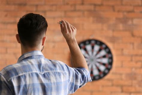 play darts  beginners guide gamesroomideas
