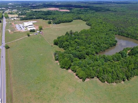 cattle farm with pond land for sale in madison morgan county
