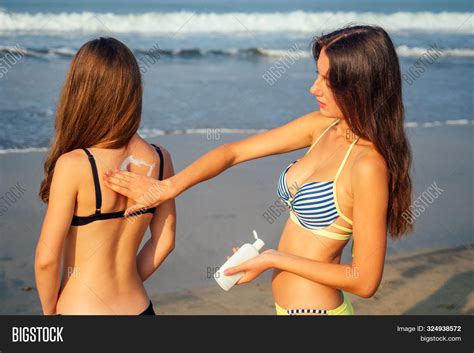 Two Sexy Girls Apply Image And Photo Free Trial Bigstock