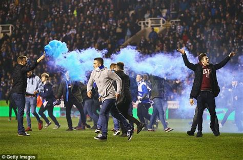 Watch Reading Fan Throw Flare At Bradford Supporters During Shameful