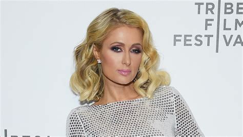 paris hilton clarifies pregnancy rumors reveals she won t be getting