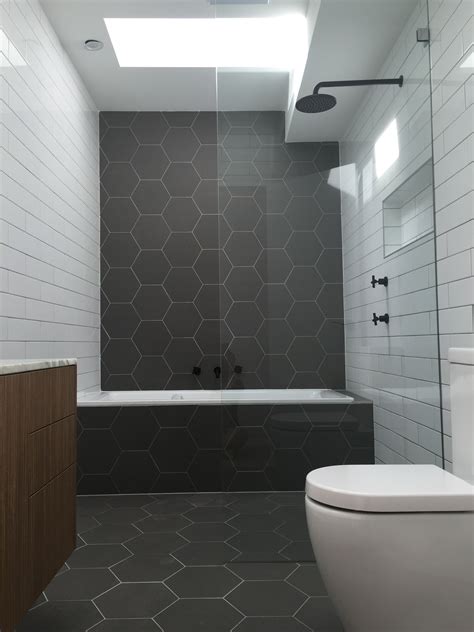bathrooms  dark tile floors
