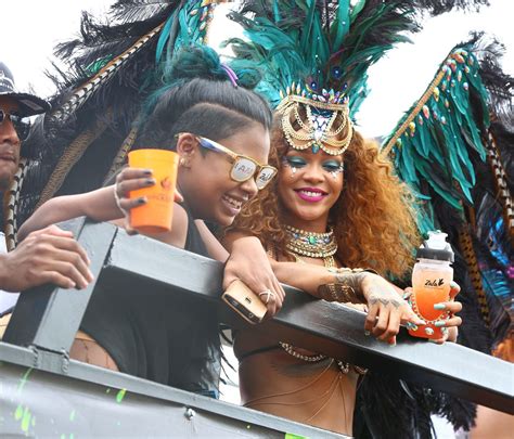 rihanna is pictured wearing a colorful costume during barbados annual