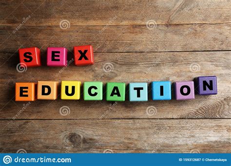 colorful blocks with phrase `sex education` on wooden background stock