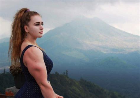 Girl With A Cute Face Is Actually A Massive Body Builder