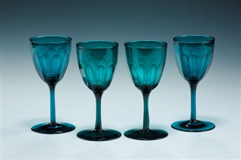 antique set of four green wine glasses