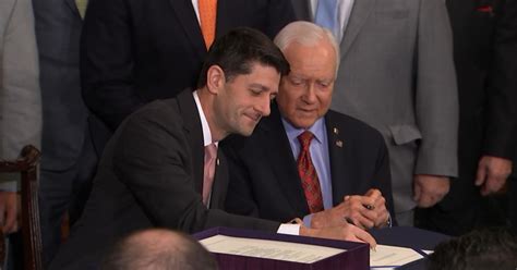 speaker ryan and senator hatch sign the tax bill for it to be sent to