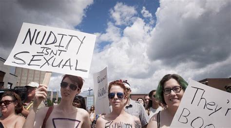 topless protest in canada urges public to ‘bare with us world news