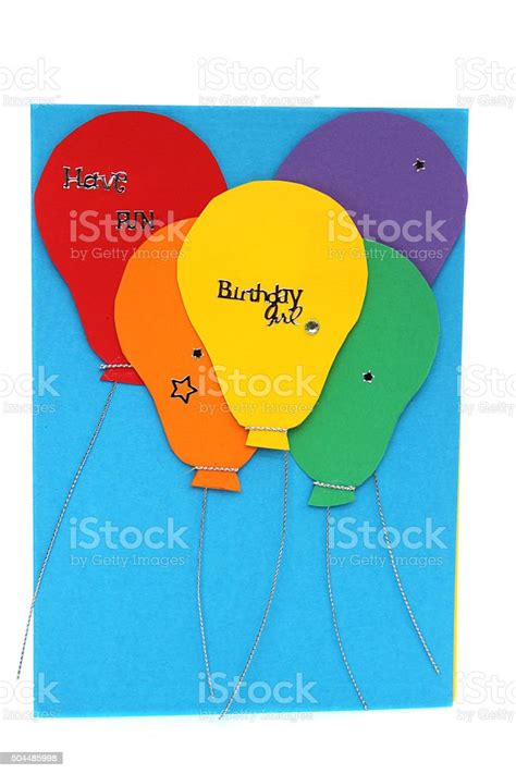 image of homemade girls birthday card with balloons in rainbowcolours