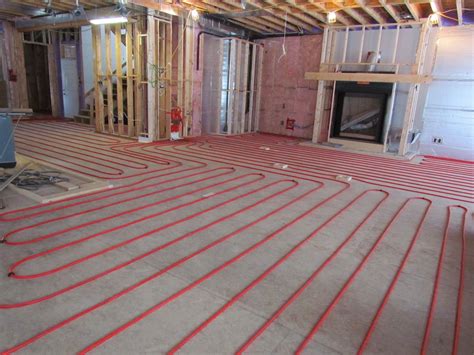 unfinished room  red piping   floor   fire place   wall
