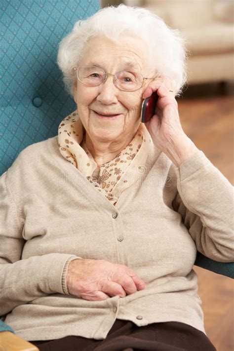 senior woman talking on mobile phone stock image image of people