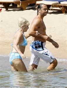 ivana trump soaks up the sun with her very attentive ex husband rossano rubicondi during holiday